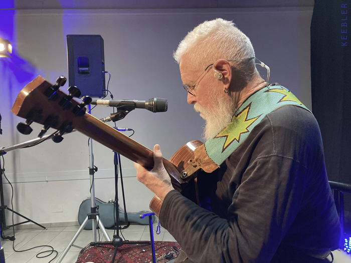 Bruce Cockburn soundcheck 8mar24 Castelfranco Italy photo Keebler