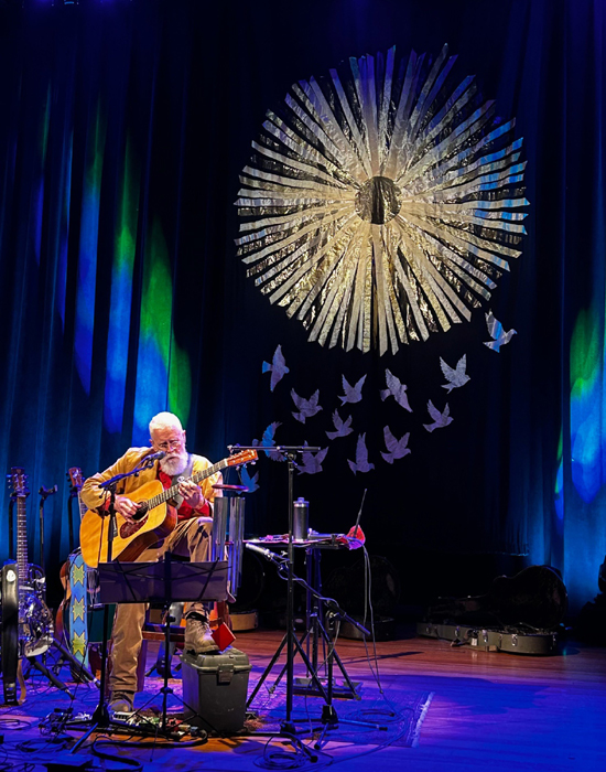 Bruce Cockburn 7May2025 Stoughton WI photo Russ Cole