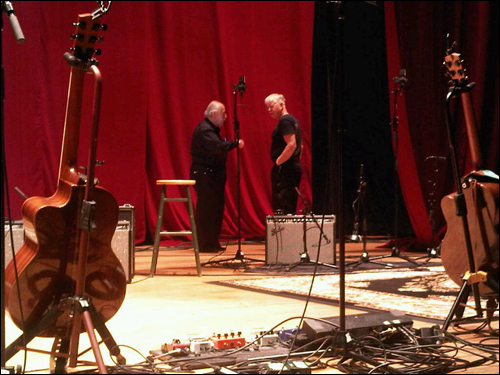 Bruce Cockburn and Bernie Finkelstein chatting during the 40 Year Tribute sound check