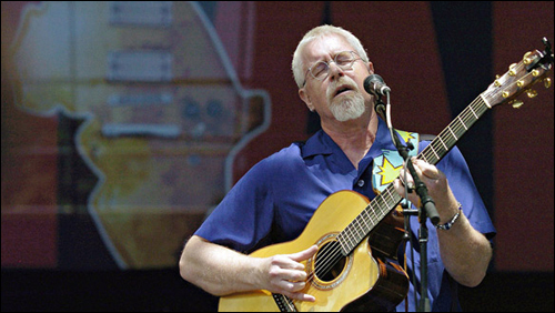 Bruce Cockburn performs during the Canadian Live 8 concert in Barrie, Ont., on July 2, 2005 - Photo: Aaron Harris/Canadian Press